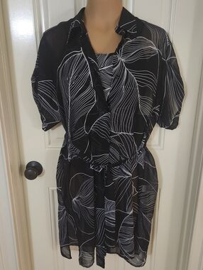 Beautiful New With Tags Chico's one piece swimsuit and cover-up.